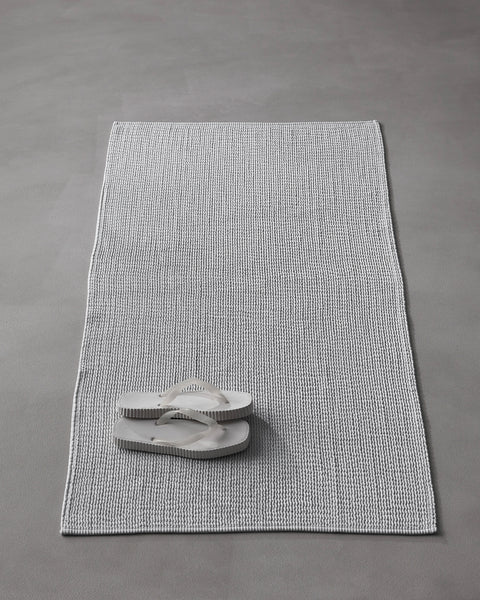 Linen bath mat